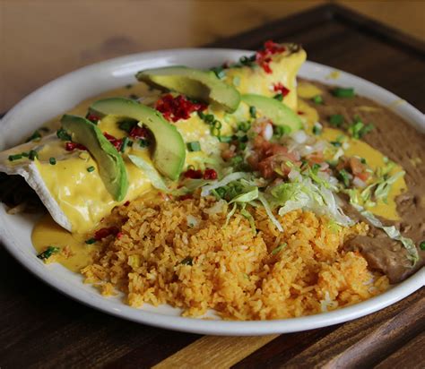 Burrito jalisco - burrito jalisco plate - chicken breast or skirt steak topped with hot sauce and frijoles de la olla served with a cheese quesadillo, green onions and guacamole Lengua En Salsa Verde O Roja $11.99 beef tongue in green or red hot sauce Lengua A La Mexicana $11.99 ...